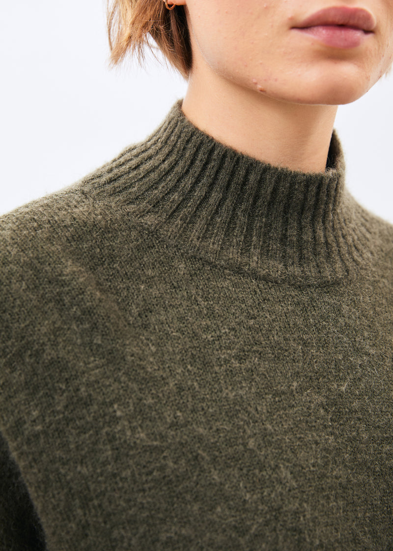 Khaki turtleneck sweater ~ humility