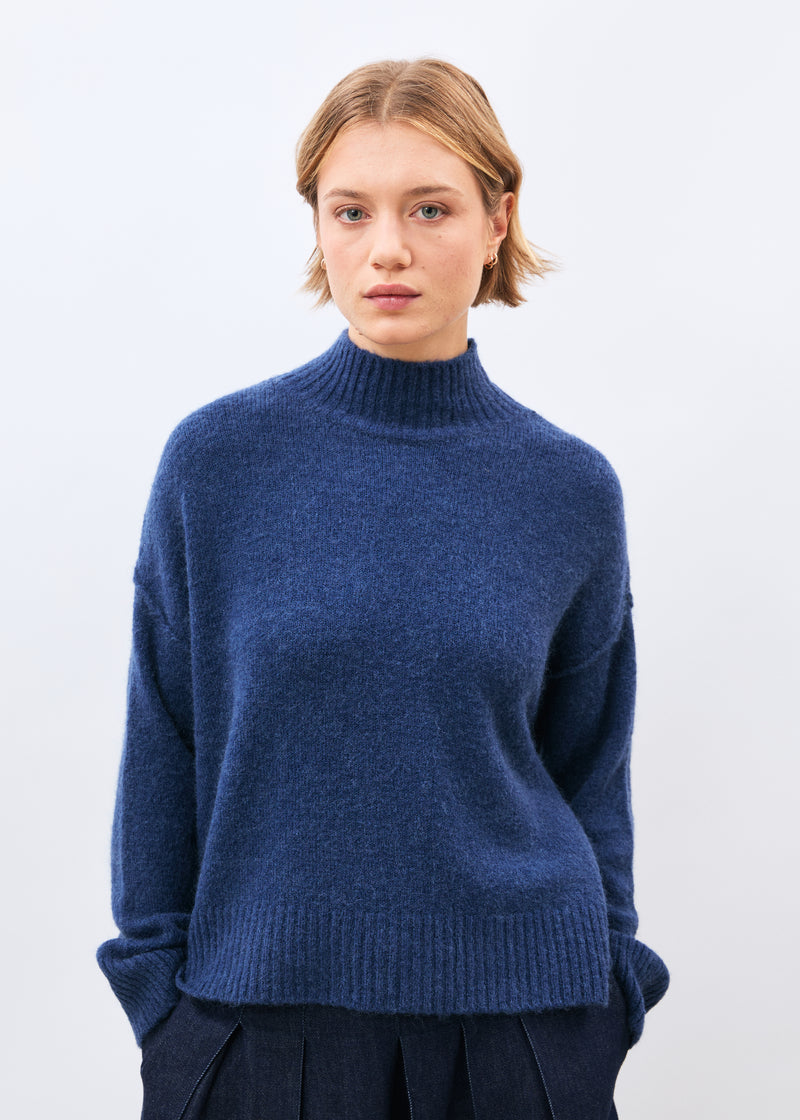 Blue high-neck sweater ~ humility