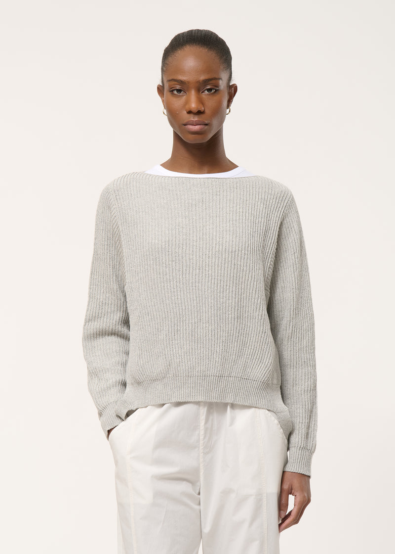 Loose grey knitted sweater